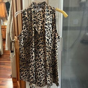 Sleeveless layering top.  Can be worn alone or layered with a jacket.